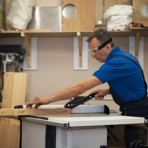 man-working-his-wood-shop-with-tools-equipment